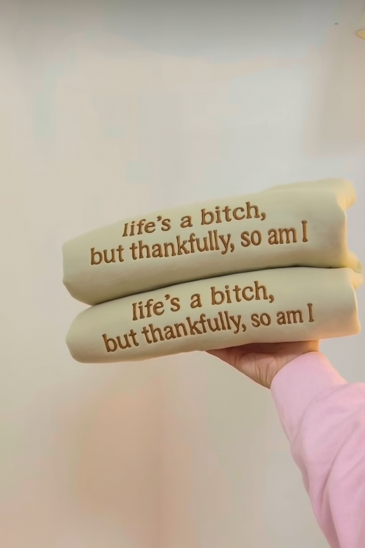Life’s a b but thankfully so am i embroidered crew